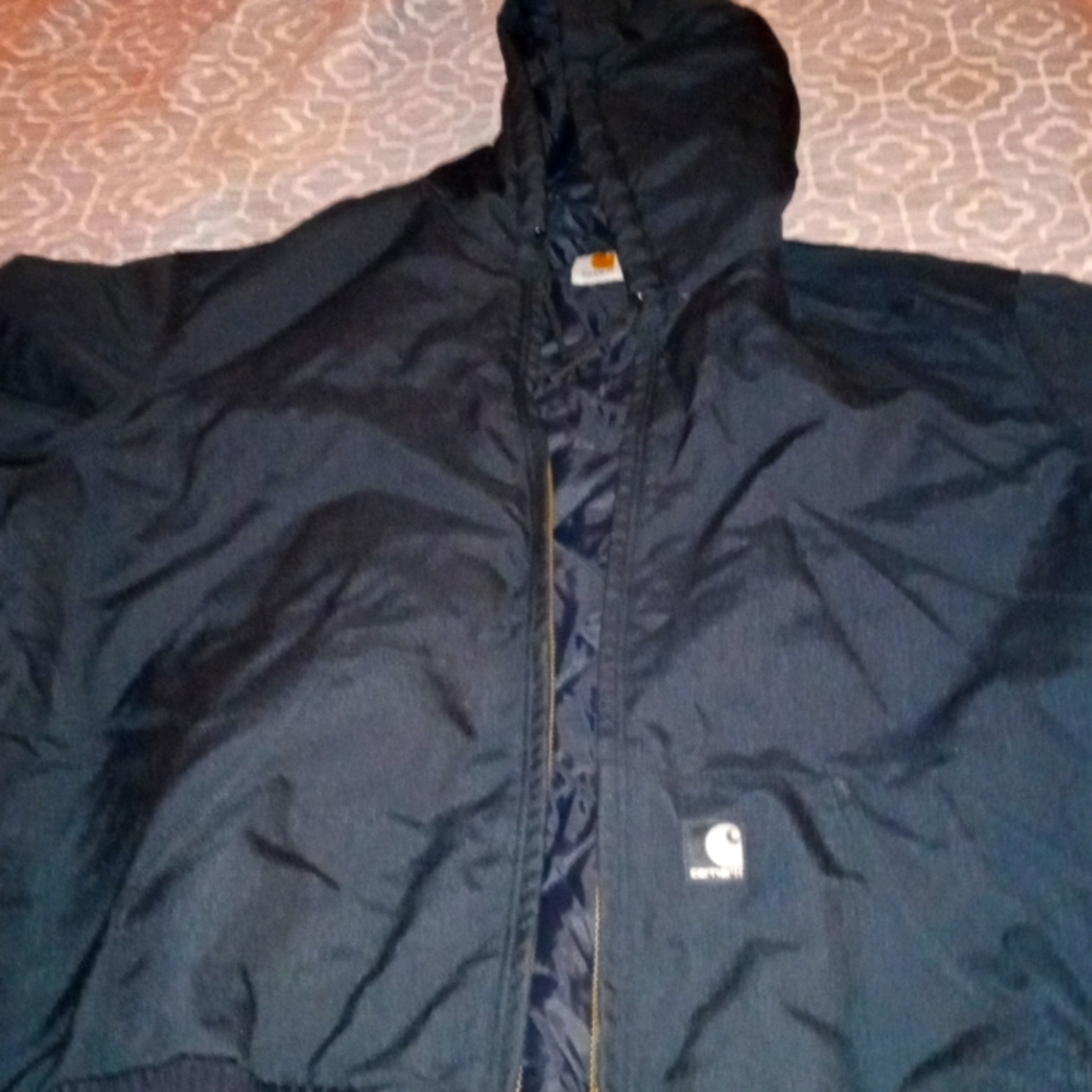 Carhartt coat,hunting vest, beanie, facemask.